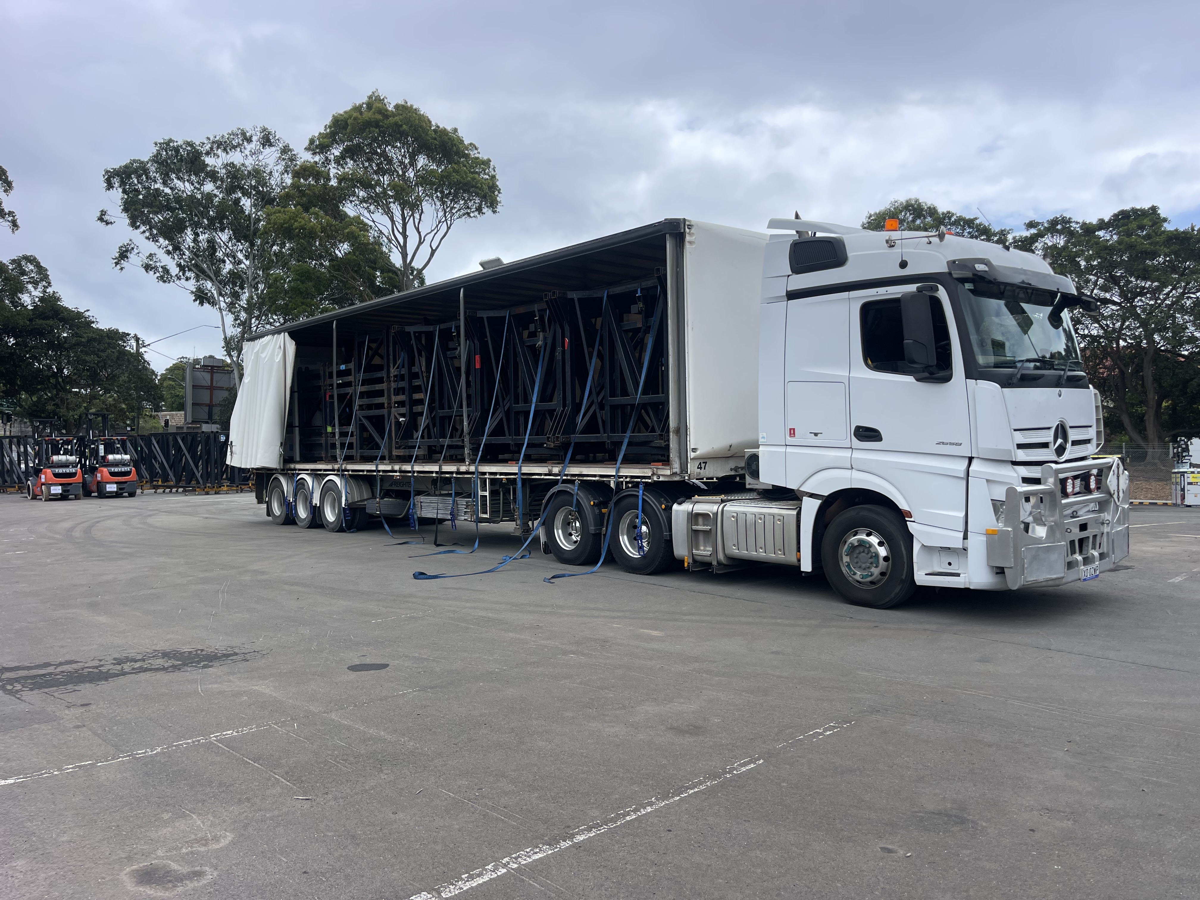 Fully loaded Quick Cargo 12 tonne truck, loading freight for same day interstate freight transport