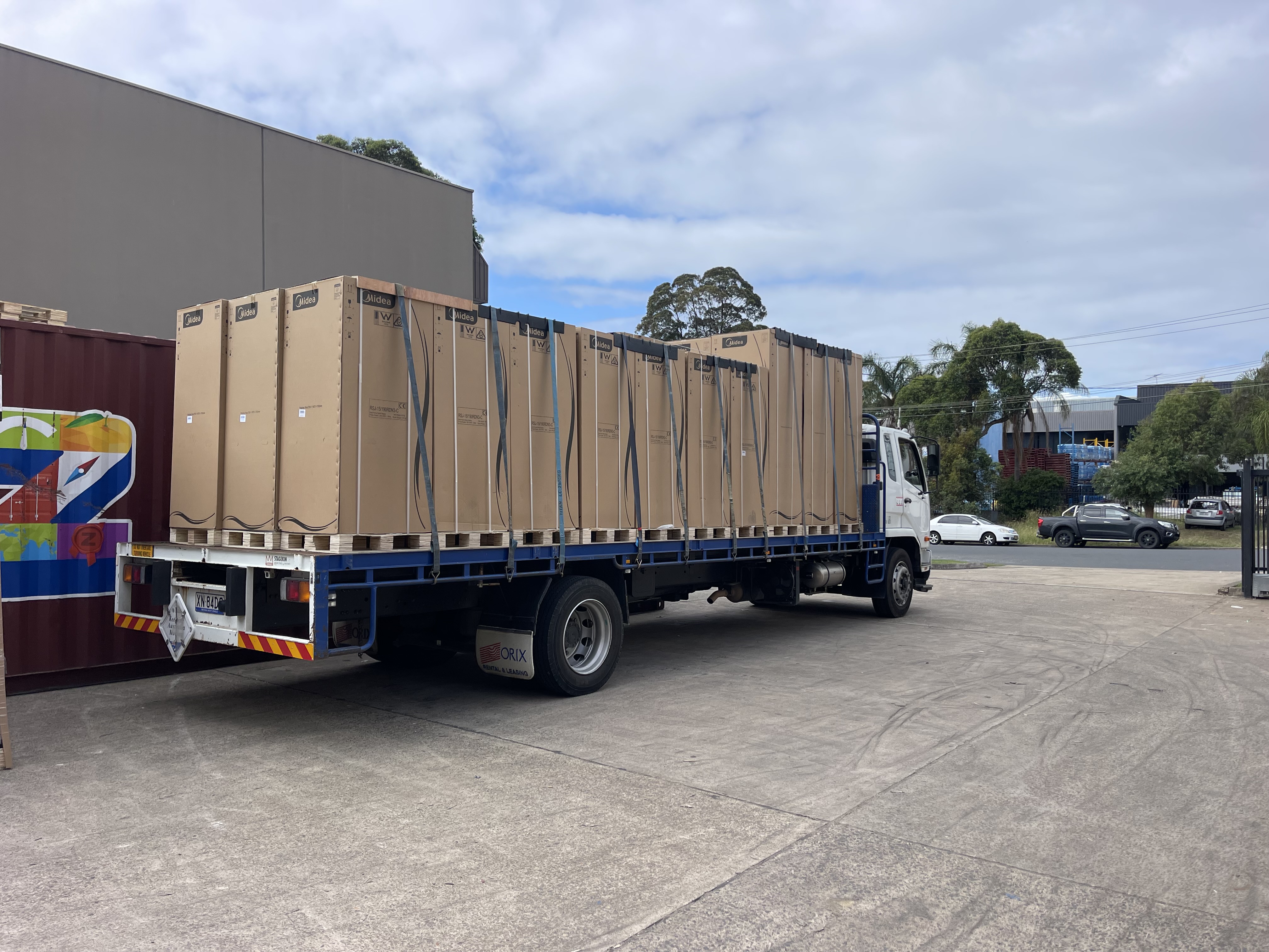 Fully loaded Quick Cargo 12 tonne truck, loading freight for same day interstate freight transport