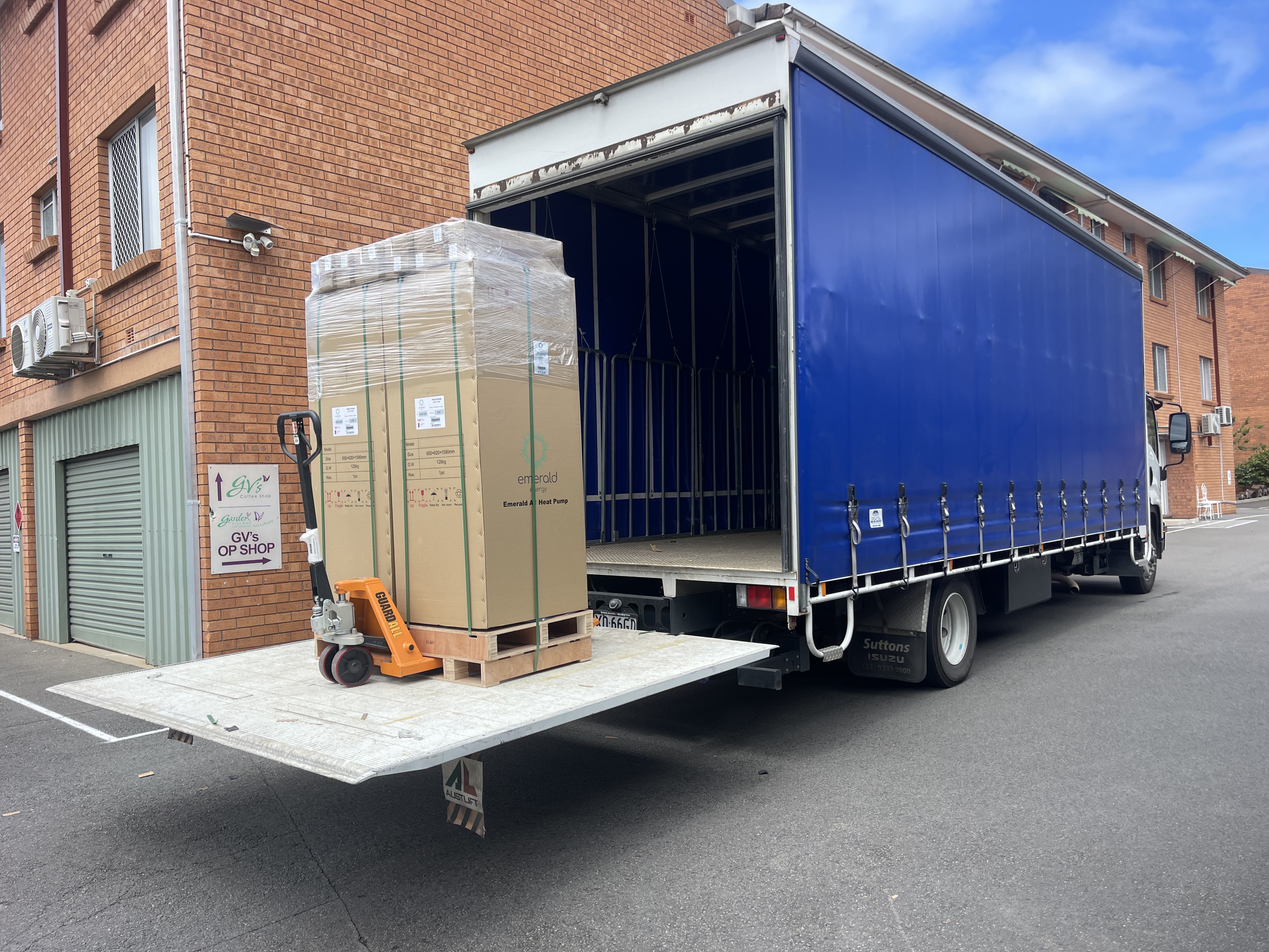 Fully loaded Quick Cargo 12 tonne truck, loading freight for same day interstate freight transport